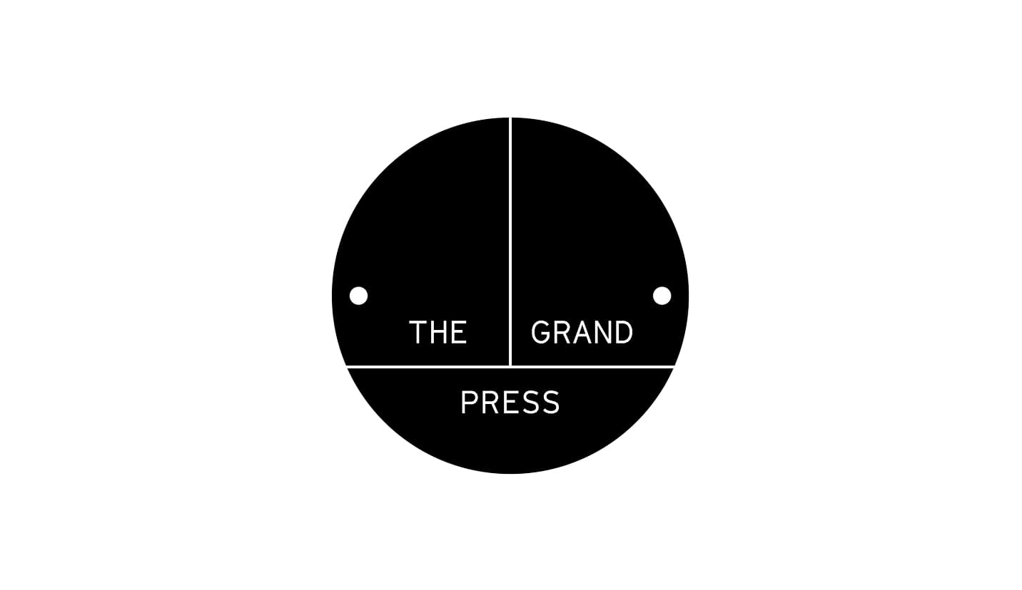 The Grand Press Logo