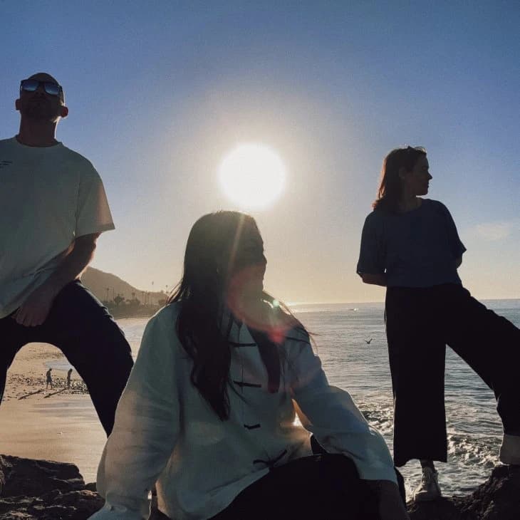 Team at sunset overlooking Los Angeles