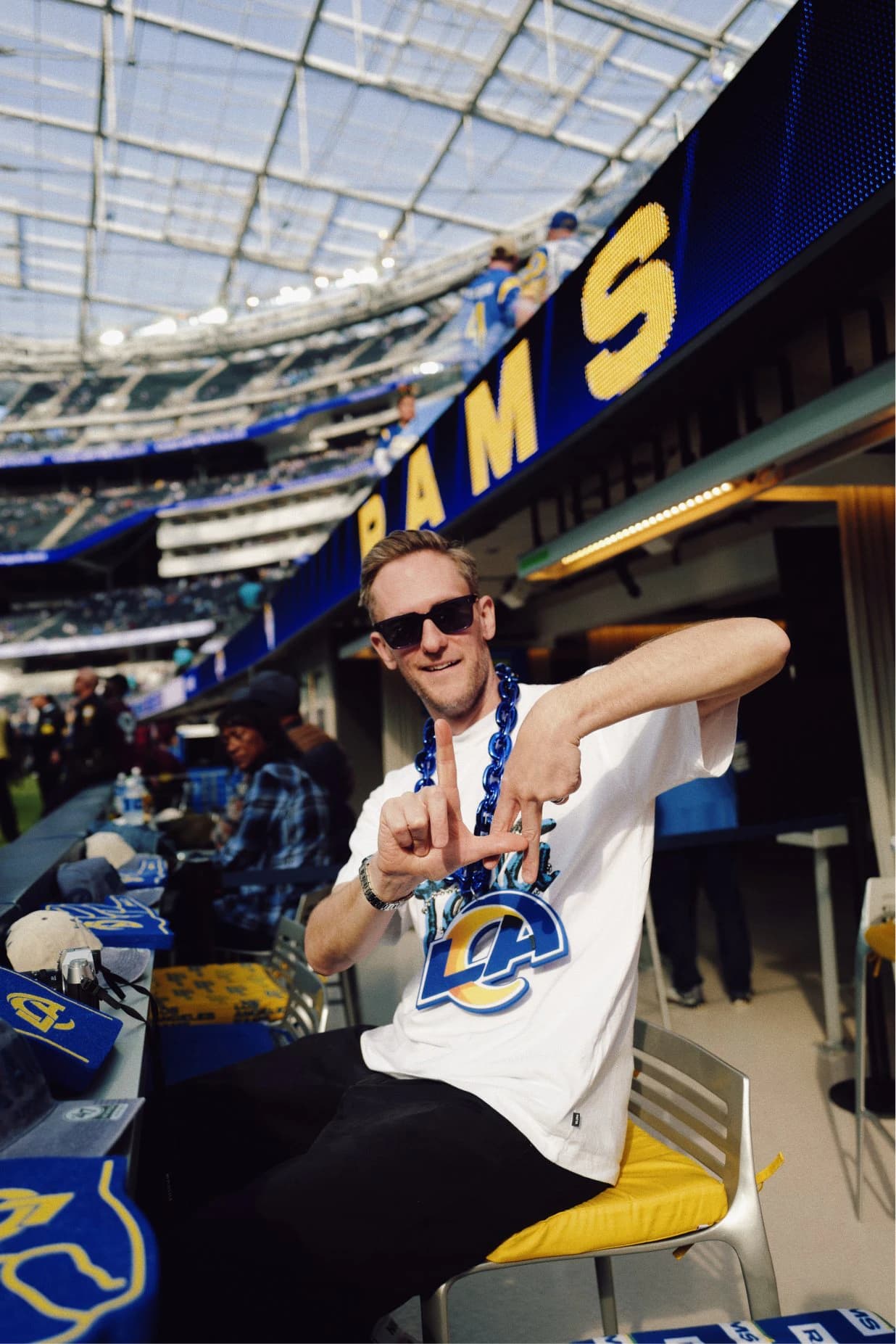 Rams fan with the new logo shirt at SoFi Stadium