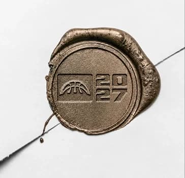 Bronze wax seal stamped with the Project B arc mark and 2027