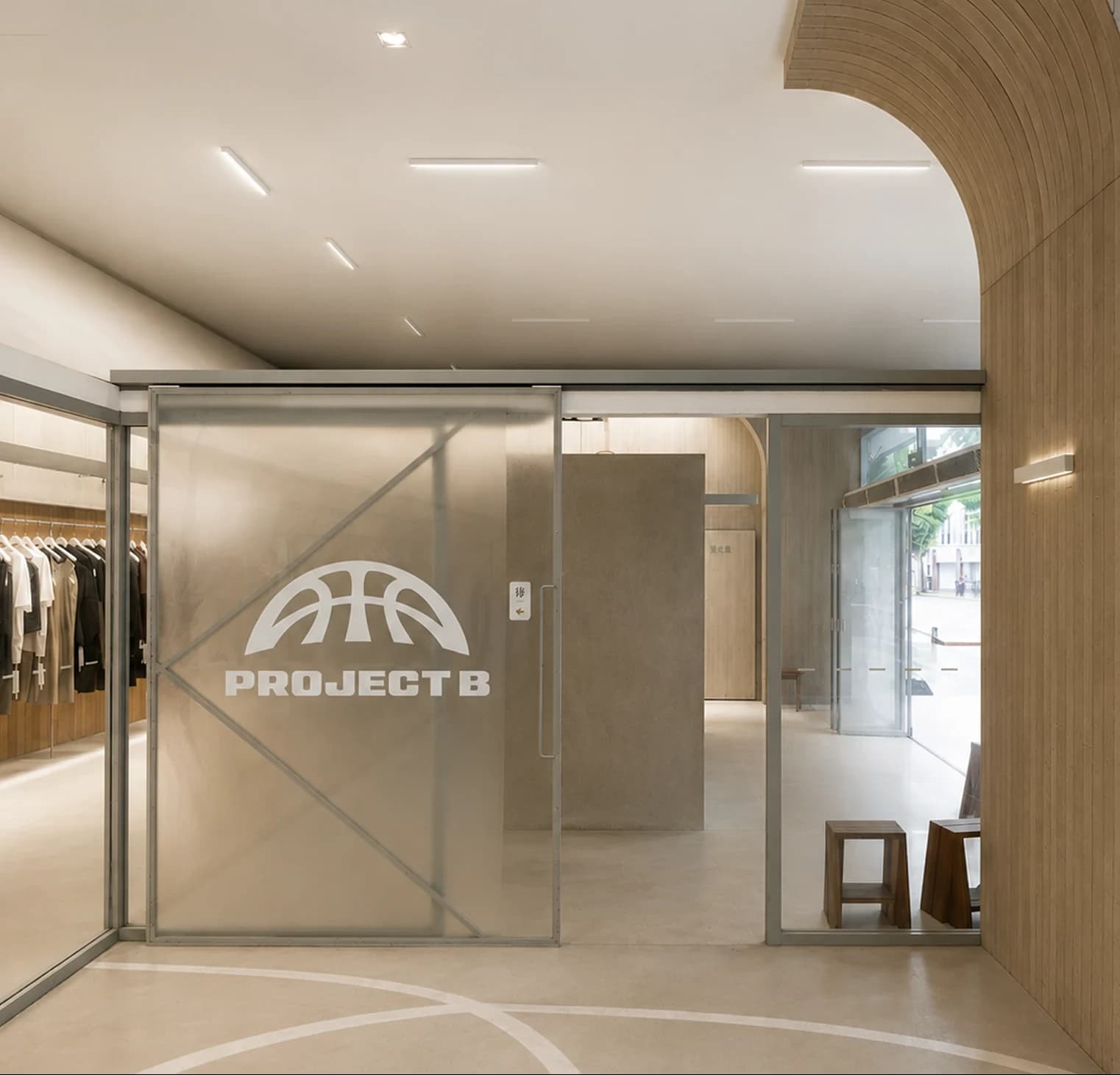 Project B flagship store entrance behind frosted glass